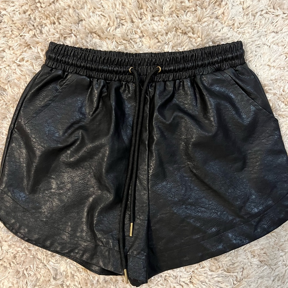 black leather material shorts